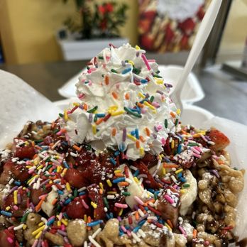 Crave it - a plate of waffles topped with whipped cream and sprinkles - Desserts Near Me - South Gate, California