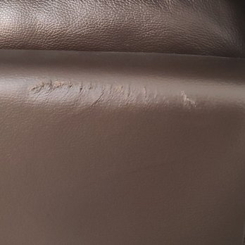 All Moves Matter - Damaged Leather Sofa because they refused to wrap it. - Movers Near Me