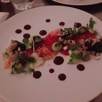 Eden - Ahi tuna crudo ($19), with charred avocado, cashew milk, and smoked grape pureé. Nice plating! - New American Near Me - Chicago, Illinois Eden - Ahi tuna crudo ($19), with charred avocado, cashew milk, and smoked grape pureé. Nice plating! - New American Near Me - Chicago, Illinois
