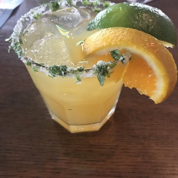 Taco Mac - Award winning margarita... It's a margarita with orange juice, rimmed with salt and cilantro. - Mexican Near Me - Suwanee, Georgia