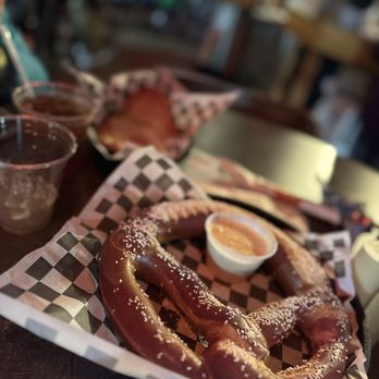 Massanutten Base Camp - Bavarian Pretzel and a Cheese Pizza in the background - Bars Near Me - Massanutten, Virginia