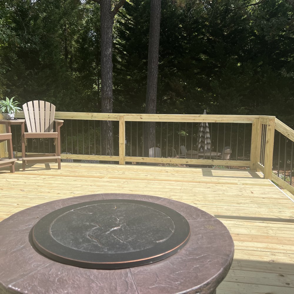 a deck with a fire pit a deck with a fire pit