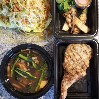 LuluBangBang - Top: papaya salad, eggplant yakitori Bottom: smothered seven springs pork chop - Cocktail Bars Near Me - Durham, North Carolina LuluBangBang - Top: papaya salad, eggplant yakitori Bottom: smothered seven springs pork chop - Cocktail Bars Near Me - Durham, North Carolina