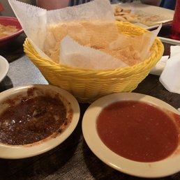Two salsas and a small cheese dip. With the best chips around- thin and crispy! Two salsas and a small cheese dip. With the best chips around- thin and crispy!