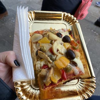 Rizzo - Pizza slice with mushrooms, bell peppers, and olives - Bakeries Near Me - Venezia, VE