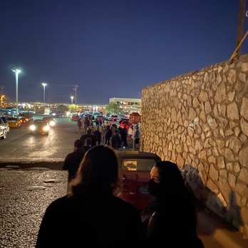 Luby's - a group of people standing in a parking lot - American Near Me - El Paso, Texas