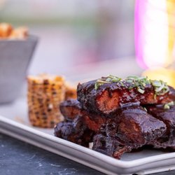 Cafe Americano - BBQ Pork Ribs: Half Rack of Smoked St. Louis Pork Ribs, BBQ Sauce, Mexican Street Corn & Fries
