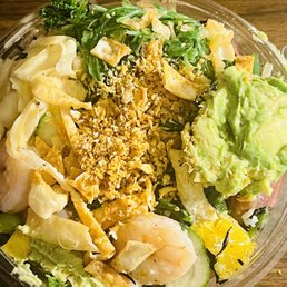 a salad in a plastic bowl