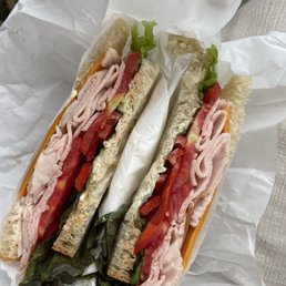 a sandwich with meat and vegetables a sandwich with meat and vegetables
