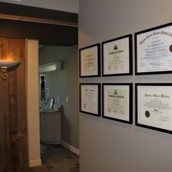 Orland Oaks Dental - Diplomas & Entry to Treatment Suite Hallway