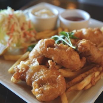 Bistro Boudin - Fish & Chips. Lightly battered for that airy, crispy bite and mildly fishy. It comes with fries and coleslaw. - Bakeries Near Me - San Francisco, California Bistro Boudin - Fish & Chips. Lightly battered for that airy, crispy bite and mildly fishy. It comes with fries and coleslaw. - Bakeries Near Me - San Francisco, California