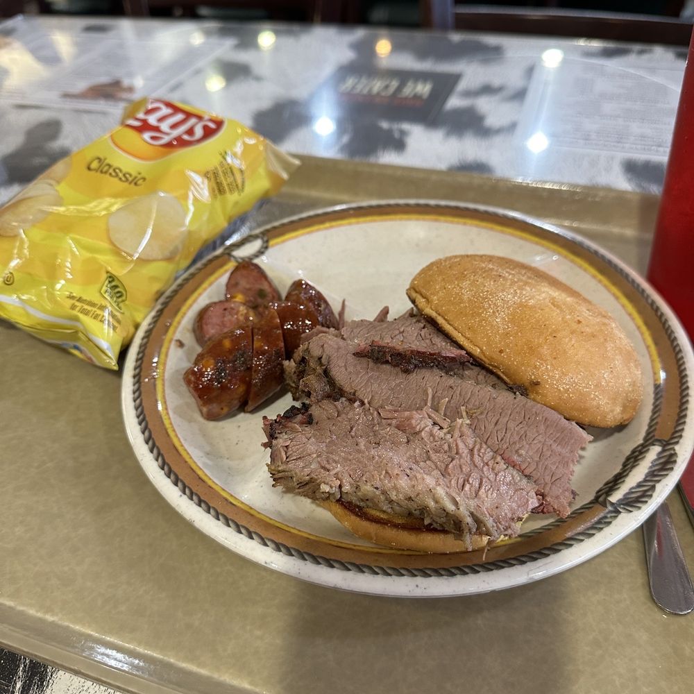 Sliced brisket sandwich with a jalapeño and cheddar cheese link It was alright, the bread was a bit tough though. Sliced brisket sandwich with a jalapeño and cheddar cheese link It was alright, the bread was a bit tough though.