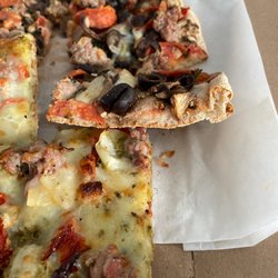 Tony Maronni's Pizza - No air. Google pinsa to see what they should look like.