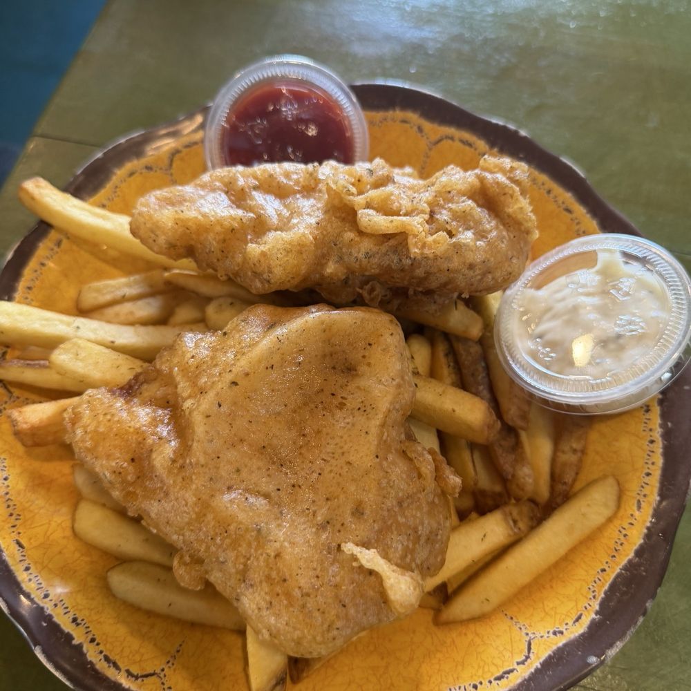 Sudi's Caribbean Bar & Grille - Mahi fish and chips. Great seasoning. - New American Near Me - St. Thomas, Virgin Islands Sudi's Caribbean Bar & Grille - Mahi fish and chips. Great seasoning. - New American Near Me - St. Thomas, Virgin Islands