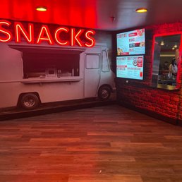 Snack shop inside to buy pizza, wings, fries and desserts