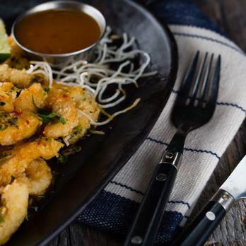 Milestones - a plate of fried shrimp with a side of sauce - Canadian (New) Near Me - Etobicoke, Ontario Milestones - a plate of fried shrimp with a side of sauce - Canadian (New) Near Me - Etobicoke, Ontario