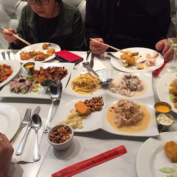 CVI.CHE 105 - Food for 4...had leftovers for sure. Octopus app, ceviche trio, jalea real (far R) - Peruvian Near Me - Miami, Florida