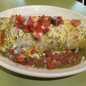 Snooze, an A.M. Eatery - Snooze Breakfast Burrito* (sausage)--- so filling! We were happy to split it 4 ways! (Add the green sauce!) - Breakfast & Brunch Near Me - The Woodlands, Texas