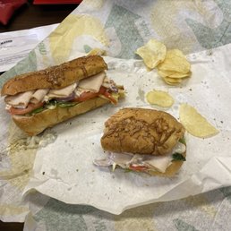 Subway Turkey Sub, with a few Lays chips. Subway Turkey Sub, with a few Lays chips.