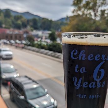 Mountain Layers Brewing Company - Dark (Elk Watch Stout Ale) on a sunny day - Breweries Near Me - Bryson City, North Carolina