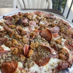 Village Pizza - Gluten free pizza comes only in the medium size. Serves  2-3 . Yummy !