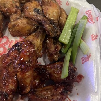 Bubba's 33 - Garlic parm wings at the top. Chipotle wings on the bottom. - Pizza Near Me - Colorado Springs, Colorado