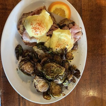 Octapas Cafe - Eggs Benedict on a gluten free bun with Brussels sprouts. - Tapas/Small Plates Near Me - Olympia, Washington Octapas Cafe - Eggs Benedict on a gluten free bun with Brussels sprouts. - Tapas/Small Plates Near Me - Olympia, Washington