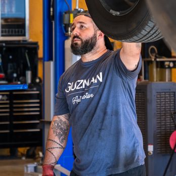 Guzman Automotive - Technican working on auto repair at Guzman Autmotive in Taylor, Texas. - Auto Repair Near Me - Taylor, Texas Guzman Automotive - Technican working on auto repair at Guzman Autmotive in Taylor, Texas. - Auto Repair Near Me - Taylor, Texas