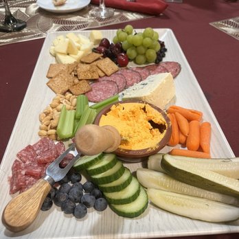 Cugini Winery - One bland white cheese, one blue cheese and one pimento cheese spread, then two meats and assorted fruits, veggies, crackers and nuts. - Wine Tasting Room Near Me - Wellington, Florida Cugini Winery - One bland white cheese, one blue cheese and one pimento cheese spread, then two meats and assorted fruits, veggies, crackers and nuts. - Wine Tasting Room Near Me - Wellington, Florida