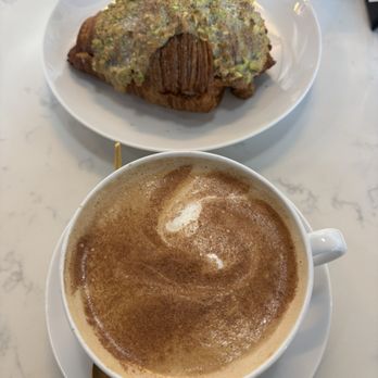Lubellas Patisserie - Pistachio croissant with cafe de olla latte - Patisserie/Cake Shop Near Me - Dallas, Texas Lubellas Patisserie - Pistachio croissant with cafe de olla latte - Patisserie/Cake Shop Near Me - Dallas, Texas