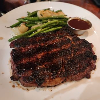 Wolfgang Puck - Ribeye with green beans and onions cooked perfect and so - American Near Me - Las Vegas, Nevada Wolfgang Puck - Ribeye with green beans and onions cooked perfect and so - American Near Me - Las Vegas, Nevada
