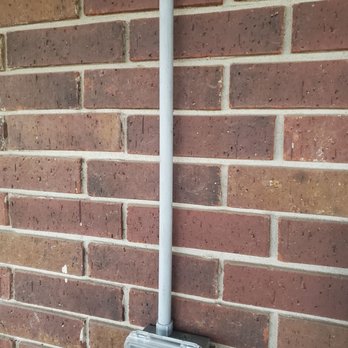 Sullivan Electric - Conduit not secured to brick. - Lighting Fixtures & Equipment Near Me - Houston, Texas