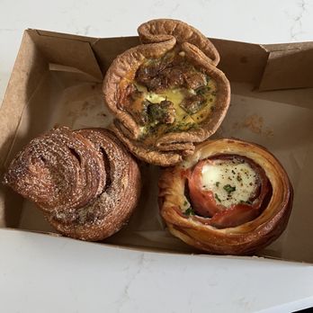 Moonbelly Bakery - Cinnamon roll, ham and cheese pastry and mortadella quiche. All flaky and delicious! - Bakeries Near Me - Sacramento, California Moonbelly Bakery - Cinnamon roll, ham and cheese pastry and mortadella quiche. All flaky and delicious! - Bakeries Near Me - Sacramento, California