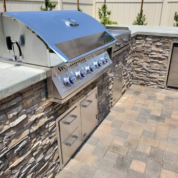 Land X Landscape Construction - BBQ island with stacked stone and a concrete countertop - Landscaping Near Me - Ontario, California
