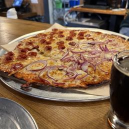Custom thin crust pizza.