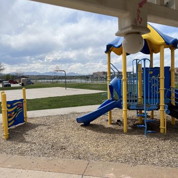 Hidden Lake Park - Playground hidden lake in the background - Parks Near Me - Arvada, Colorado