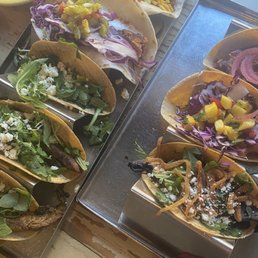 Variety of tacos, served family style Variety of tacos, served family style