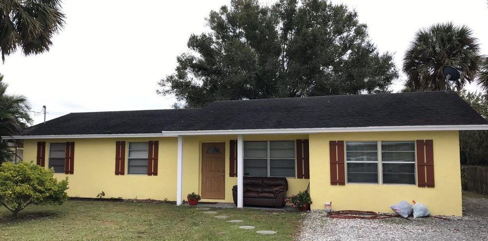 Slide of OCC Quality Roofing