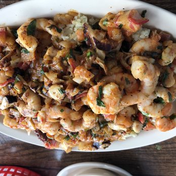 La Palapa - Rompecolchon A La Plancha (on the grill) which is a seafood combination on the bed of rice. - Seafood Near Me - Chicago, Illinois