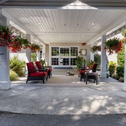 Aegis Living Issaquah - Entrance and community dog