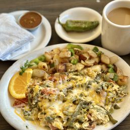 Nopalito Egg Scramble with O'Brien's potatoes, coffee and a grilled Jalapeño!