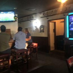 people sitting at a bar people sitting at a bar