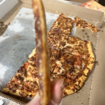 Caniglia's a Mano - Literally thin as paper - Pizza Near Me - Papillion, Nebraska Caniglia's a Mano - Literally thin as paper - Pizza Near Me - Papillion, Nebraska