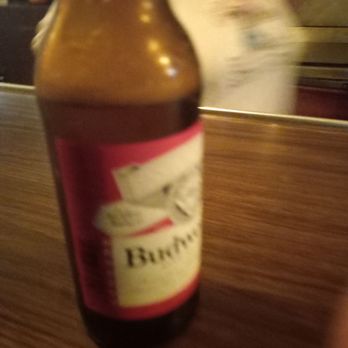 Casey's Bar - a bottle of beer on a table - Bars Near Me - Detroit, Michigan Casey's Bar - a bottle of beer on a table - Bars Near Me - Detroit, Michigan