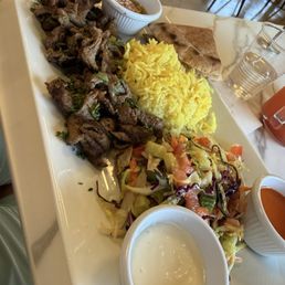 Lamb Shawarma Plate - the rice is fluffy and butter very delicious plate, the salad needs a bit more salt for us but that was an easy fix. Lamb Shawarma Plate - the rice is fluffy and butter very delicious plate, the salad needs a bit more salt for us but that was an easy fix.