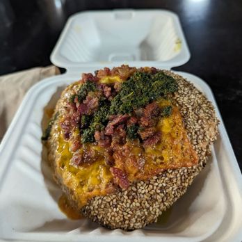 Kismet Bialys - Bacon egg and cheese with zhug. Just ok. - Bagels Near Me - Philadelphia, Pennsylvania Kismet Bialys - Bacon egg and cheese with zhug. Just ok. - Bagels Near Me - Philadelphia, Pennsylvania