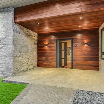 Transformations Custom Build - Custom built front porch with Sapele wood and blue Lueders stone. - General Contractors Near Me - Austin, Texas