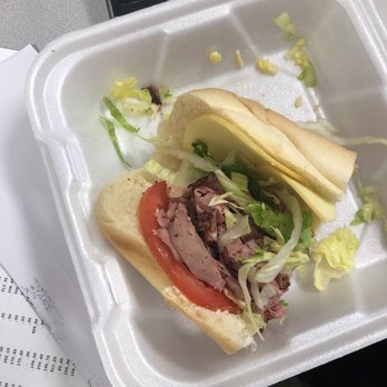 Howies Subs & Sandwiches - a sandwich in a styrofoam container - Sandwiches Near Me - Miramar, Florida