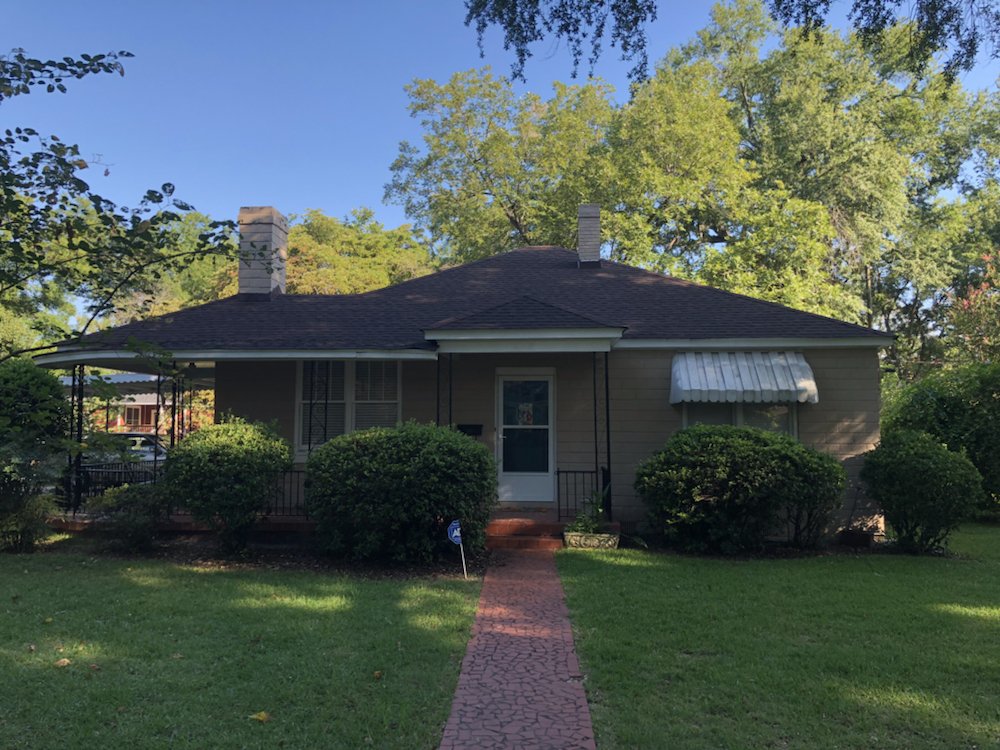 Slide of All About Roofing