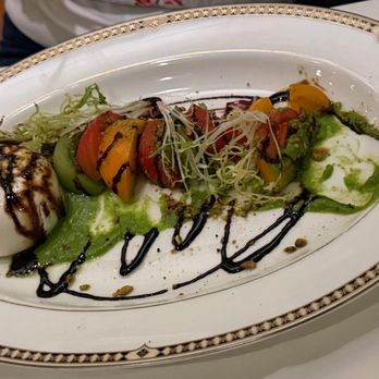 Steakhouse at The Mission Inn - Burrata Tomato Salad - Steakhouses Near Me - Riverside, California Steakhouse at The Mission Inn - Burrata Tomato Salad - Steakhouses Near Me - Riverside, California